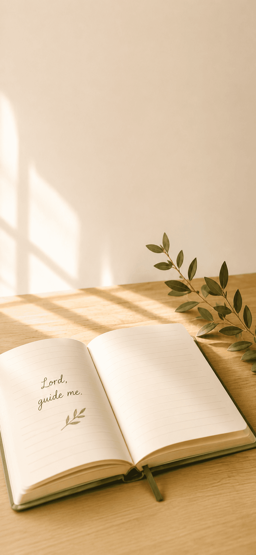 An open journal with the words 'Lord, guide me' beside an olive branch